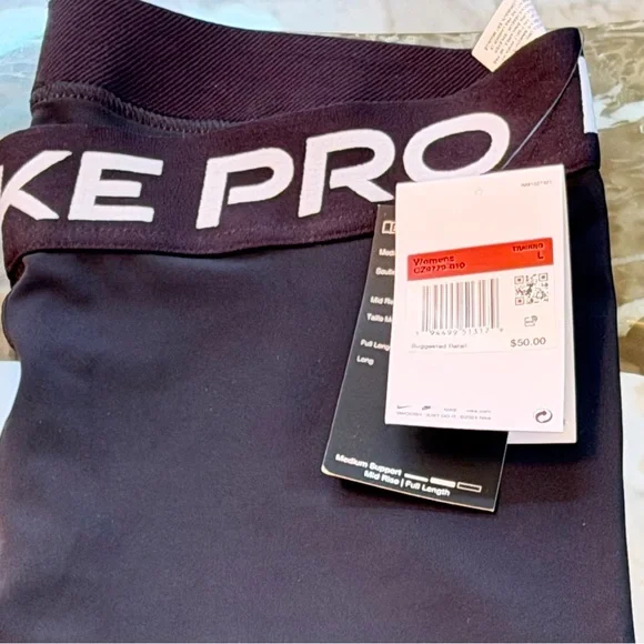 NWT- Nike Pro Mid-Rise Mesh-
Paneled Leggings - Picture 7 of 11